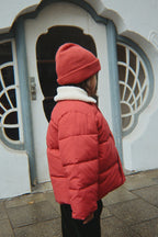 giacca rossa ciliegie alpi